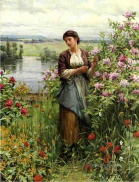 Julia entre las rosas compatriota Daniel Ridgway Knight Pinturas al óleo